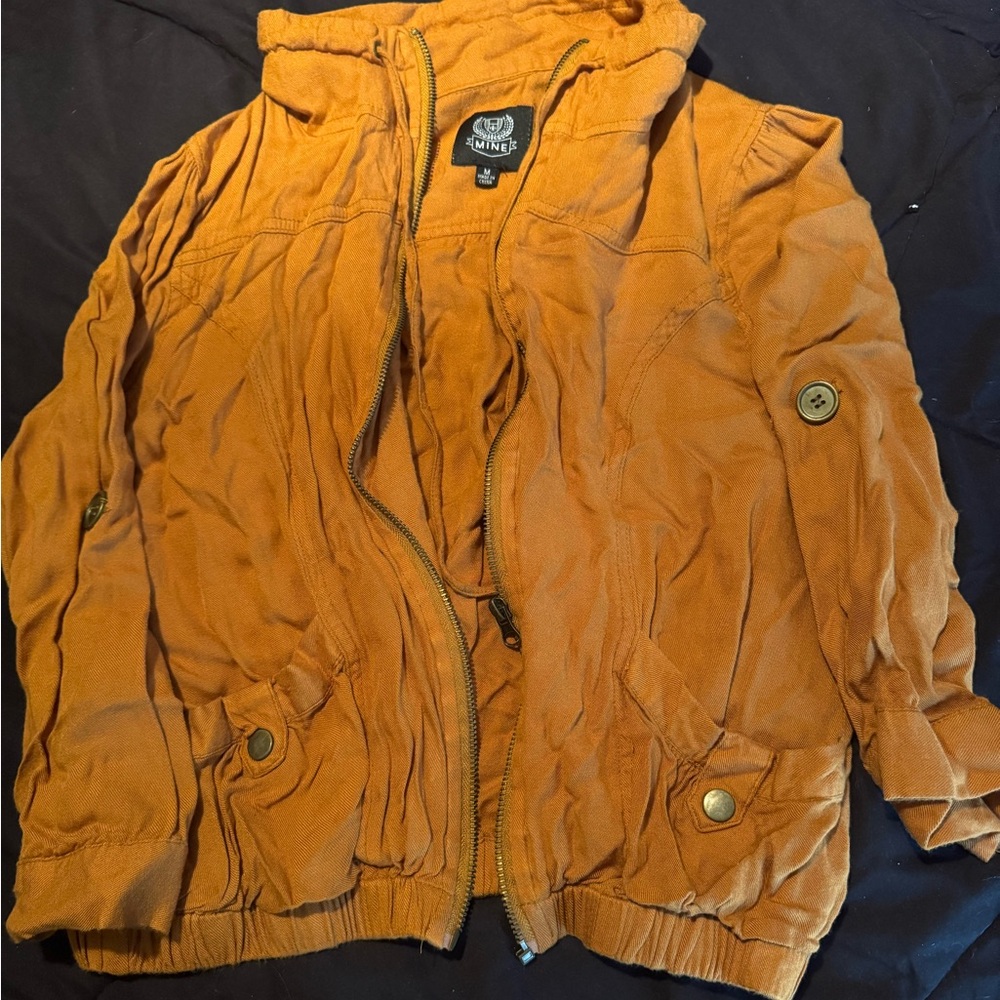 Yellow jacket. Comes to elbow with sleeves.